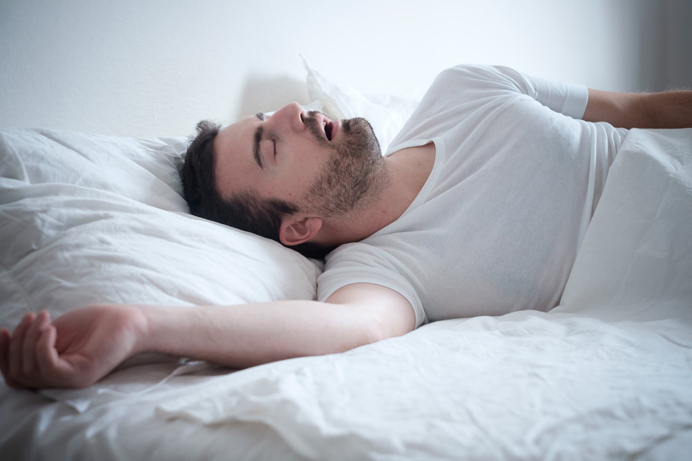 Man With Sleep Apnea (How Dental Care Helps Sleep Apnea)