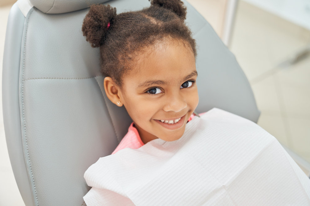 Girl at Dentist (Glossary of Kid-Friendly Dental Terms)